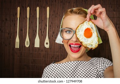 Woman Cook Holding Pan With Fried Egg - Close Up