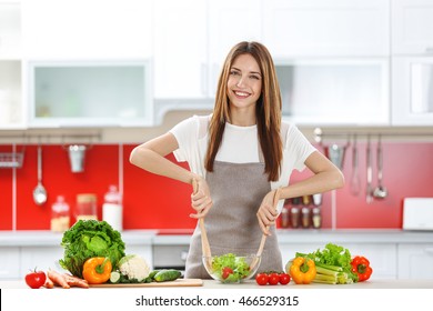 Woman Cooking  Healthy Food In The Kitchen