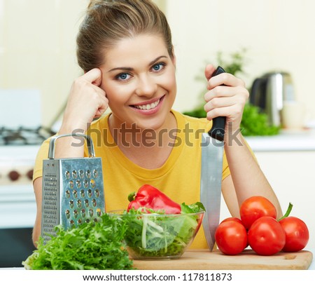 woman cooking  healthy food in the kitchen