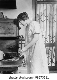 Woman Cooking On Stove Stock Photo 99373511 | Shutterstock