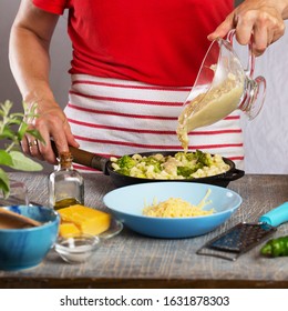 Woman Cooking Pasta With White Cream Sauce At Home In The Kitchen