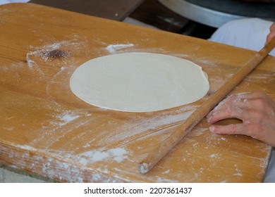Woman Cooking Turkish Pancakes Gozleme Pastry, The National Dish Of Turkish Cuisine.