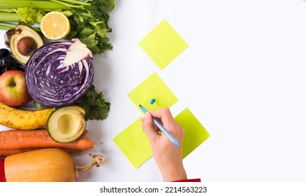 Woman Counting Calories For Healthy Food Preparation. Lifestyle 