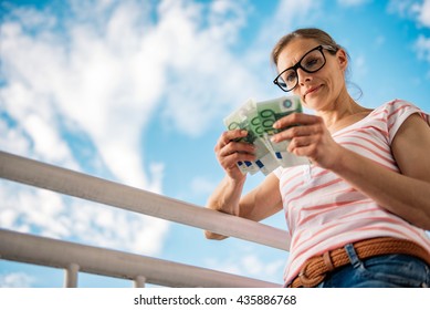 Woman counting money