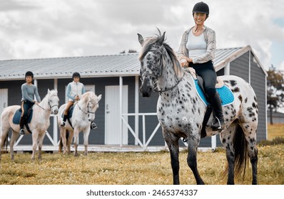 Woman, countryside and horseback riding or equestrian portrait, Appaloosa horse and friends on agriculture ranch. Outdoor sport, hobby and holiday in Argentina with rider, mare and holding reins - Powered by Shutterstock