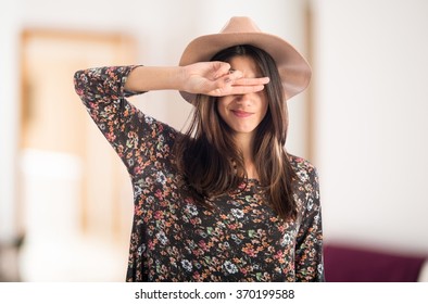 Woman Covering Her Eyes 