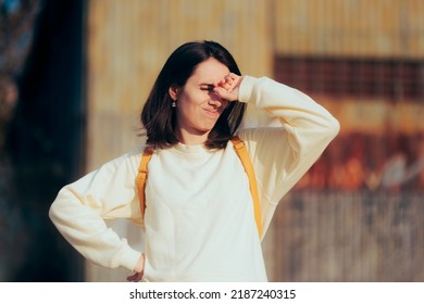 
Woman Covering Her Eyes From Strong Sun Shining In Her Face. Unhealthy Sunlight Exposure For Vision Due To UV Rays
