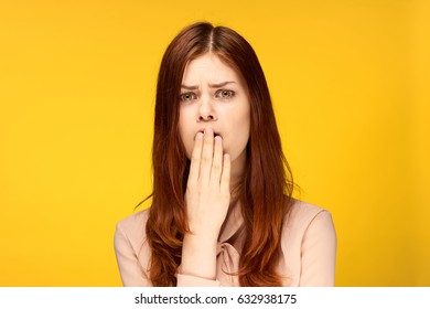 woman-covering-mouth-hand-260nw-632938175.jpg