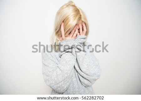 Similar – Young blonde woman with a headache