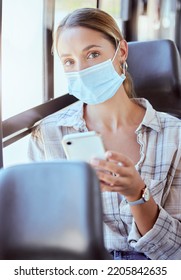 Woman, Covid And Phone In Travel Bus For Health Safety, News And Social Media With Mask. Portrait Of A Female Traveler In Public Transport During Pandemic On Mobile Smartphone For Communication