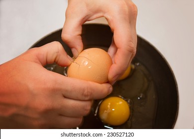 Woman Cracking Eggs Into Fry Pan With Drama Instagram Filter