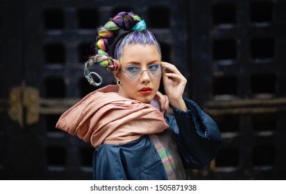 Woman With Crazy Dreadlocks, Eyeglasses And Piercings - Edgy Girl On Streets With Avant-garde Fashion Style