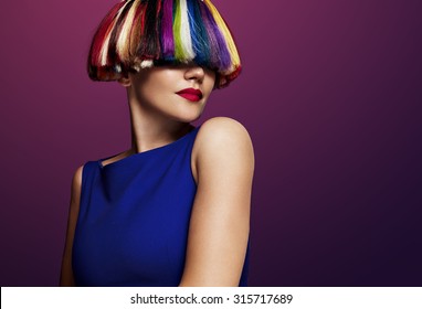 Woman With A Creative Color Of Hair. Rainbow Hair