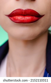 Woman With Creative Joker Makeup. Trendy Halloween Carnival Costume. Lips Close-up Macro. Stylish Fantasy Glamorous Make-up. Madness. Crazy Anxiety Image Mood. Clown Mouth