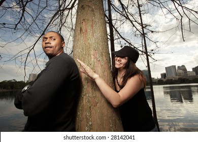 Woman Creeping Up On The Man