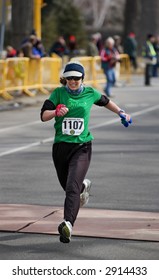 Woman Crosses Finish Line Of 5K Race - The Human Race, St. Paul, Minnesota, March 18th, 2007