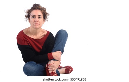 Woman Crouching On A White Background