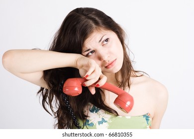 Woman Crying After Phone Call.