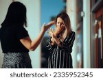 

Woman Crying Fighting with Her Best Friend Outdoors. Unhappy emotional girl disagreeing with her sister 
