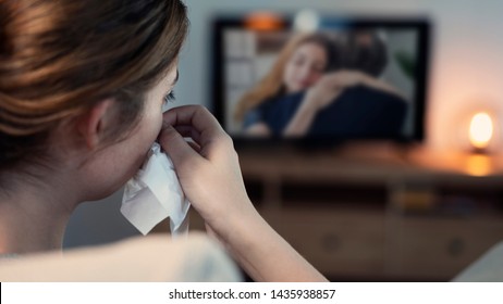 Woman Crying While Watching Tv In The Night