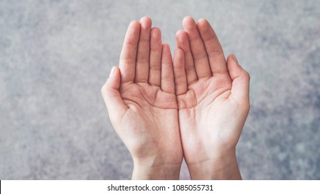 Woman Cupped Hands Holding Something