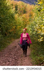 Woman With Curly Hair, Nature Photographer, Hiking In The Mountain Forests