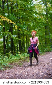 Woman With Curly Hair, Nature Photographer, Hiking In The Mountain Forests