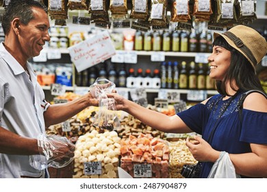 Woman, customer and buying in supermarket, choosing and select food products or organic groceries. People, man and support consumer in shopping at store, sales and assistance with tourist purchase - Powered by Shutterstock