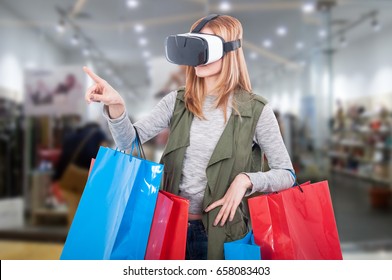 Woman Customer Experience Virtual Shopping Thru Modern Headset And Pointing Finger At Something