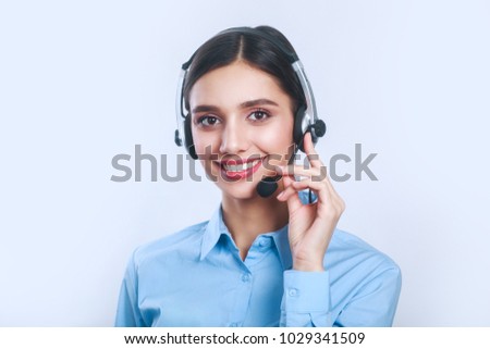 Woman customer service worker, call center smiling operator with phone headset