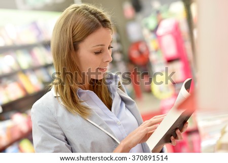 Woman customer shopping in book store