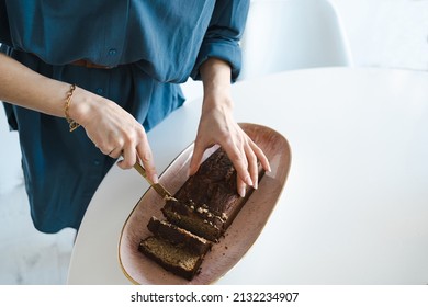 Woman Cuts Home Made Banana Bread