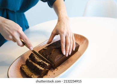 Woman Cuts Home Made Banana Bread