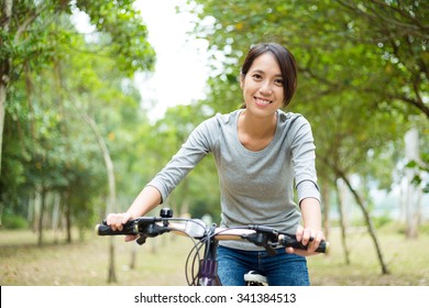 9,814 Asian woman cycling outdoor Images, Stock Photos & Vectors ...