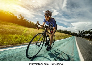 Woman Cycling outdoor exercise bike paths - Powered by Shutterstock