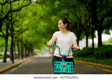 Woman Cycling Through Green Park - Powered by Shutterstock