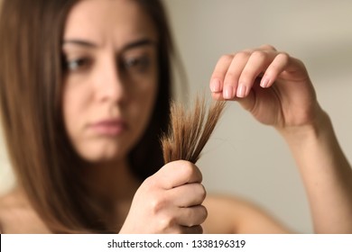 Woman Damaged Hair On Blurred Background Stock Photo 1338196319 Woman Damaged Hair On Blurred Background Stock Photo 1338196319