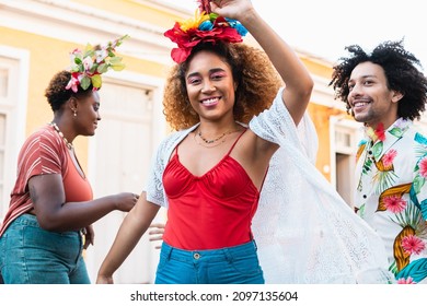 Woman Dance During Carnival Day In Brazil. People In Costume Enjoy Brazilian Party Of Carnaval In The Street.