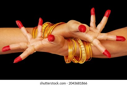 Woman dancer hands on black background showing "Avahittha hasta" meaning dissimulation as a mudra of Indian Bharatanatyam classical dance