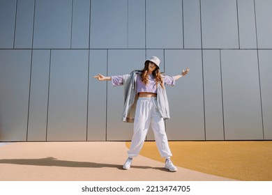 Woman Dancerfront Of Wall. Breakdancing, Street Dancing, Hiphop, Freestyle Dance.