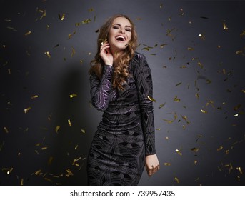 Woman Dancing With Falling Confetti 
