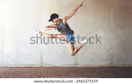 Similar – Unrecognizable women jumping over garden fence background