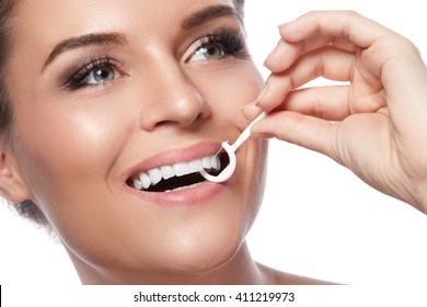 Woman And Dental Floss Pick On White Background