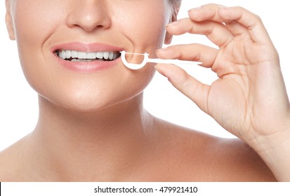 Woman And Dental Floss Pick On White Background