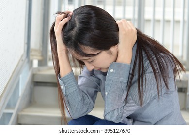 Woman in depression - Shutterstock ID 395127670
