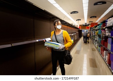 Woman Desparately Looks For Supplies And Paper Products During Epidemic Shortage.