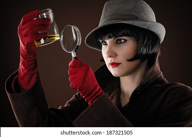 Woman Detective Examines The Evidence