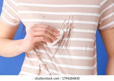 Woman In Dirty Clothes And With Napkin On Color Background, Closeup