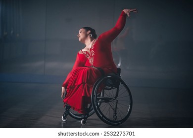 Woman with a disability, a para dancer practicing choreography at the dance studio, making wheelchair spin and elegant arm moves. - Powered by Shutterstock