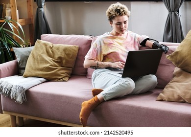 Woman with disability using laptop